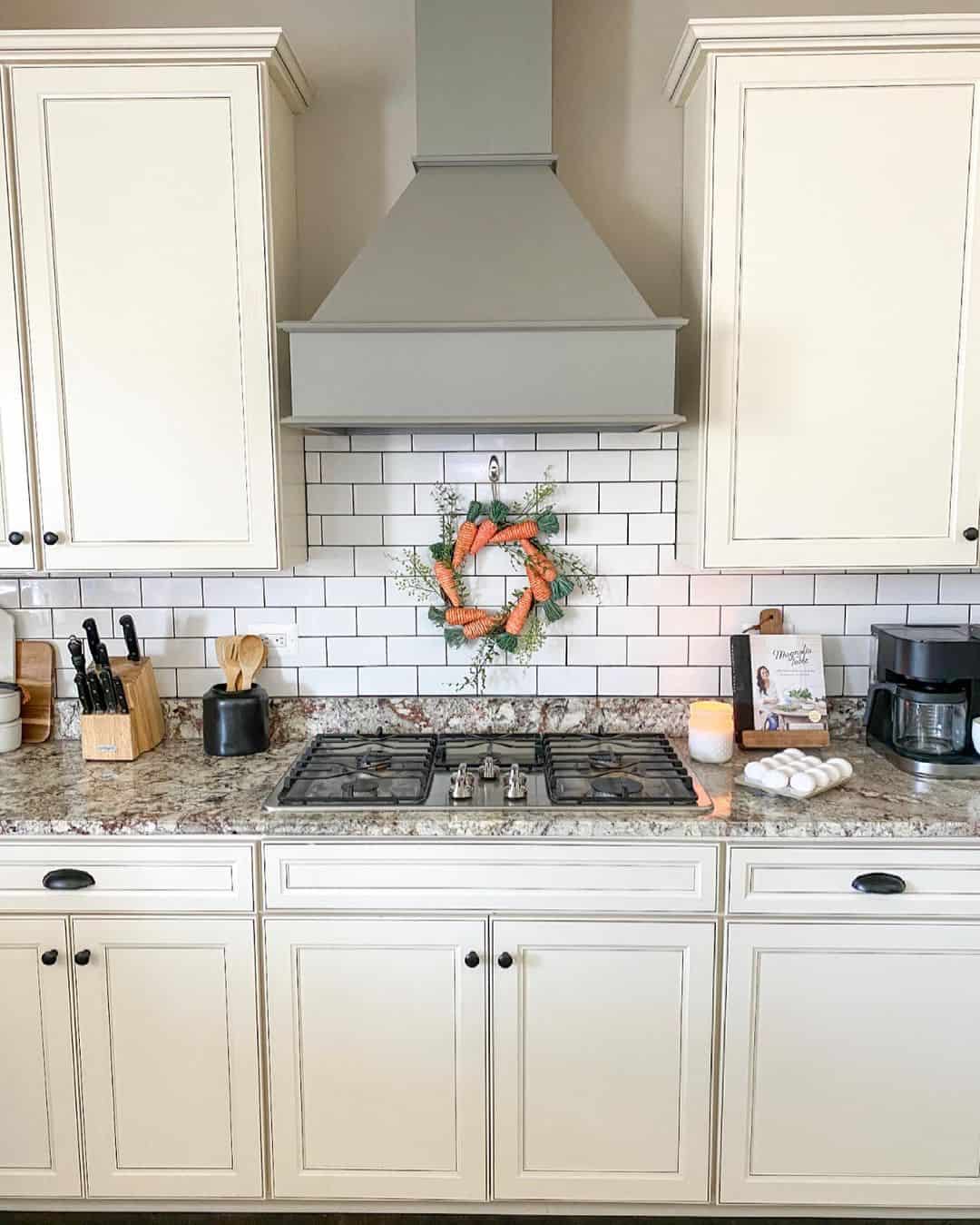 Easter-Inspired White Subway Tile Backsplash with a Carrot Wreath