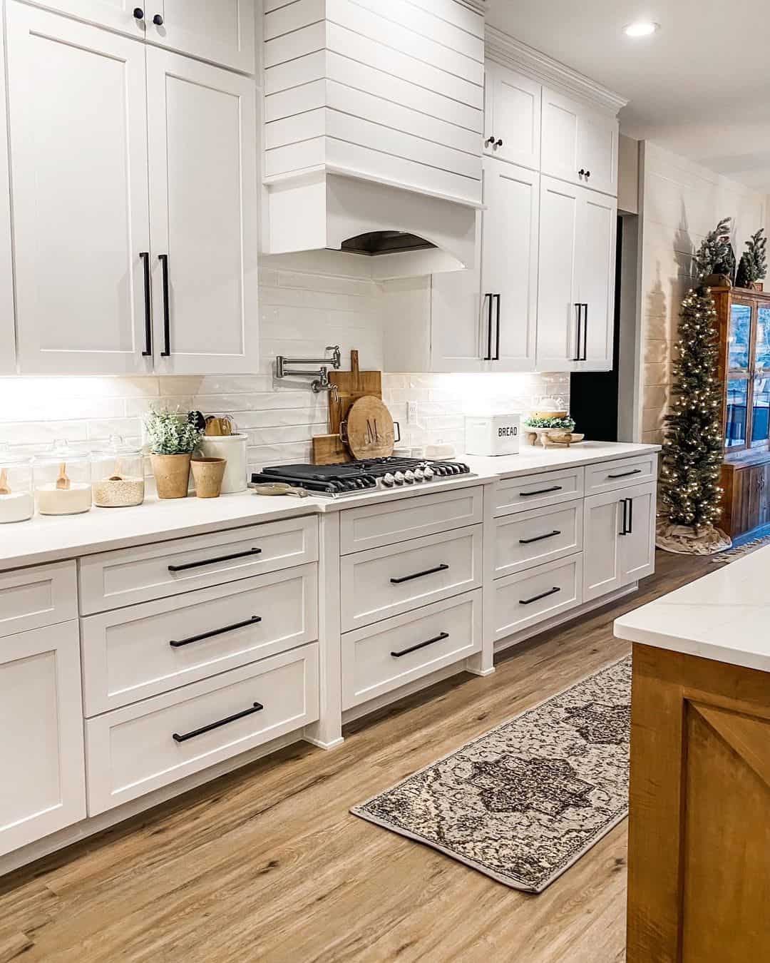 Elegant Black Pulls Enhance White Kitchen Cabinets