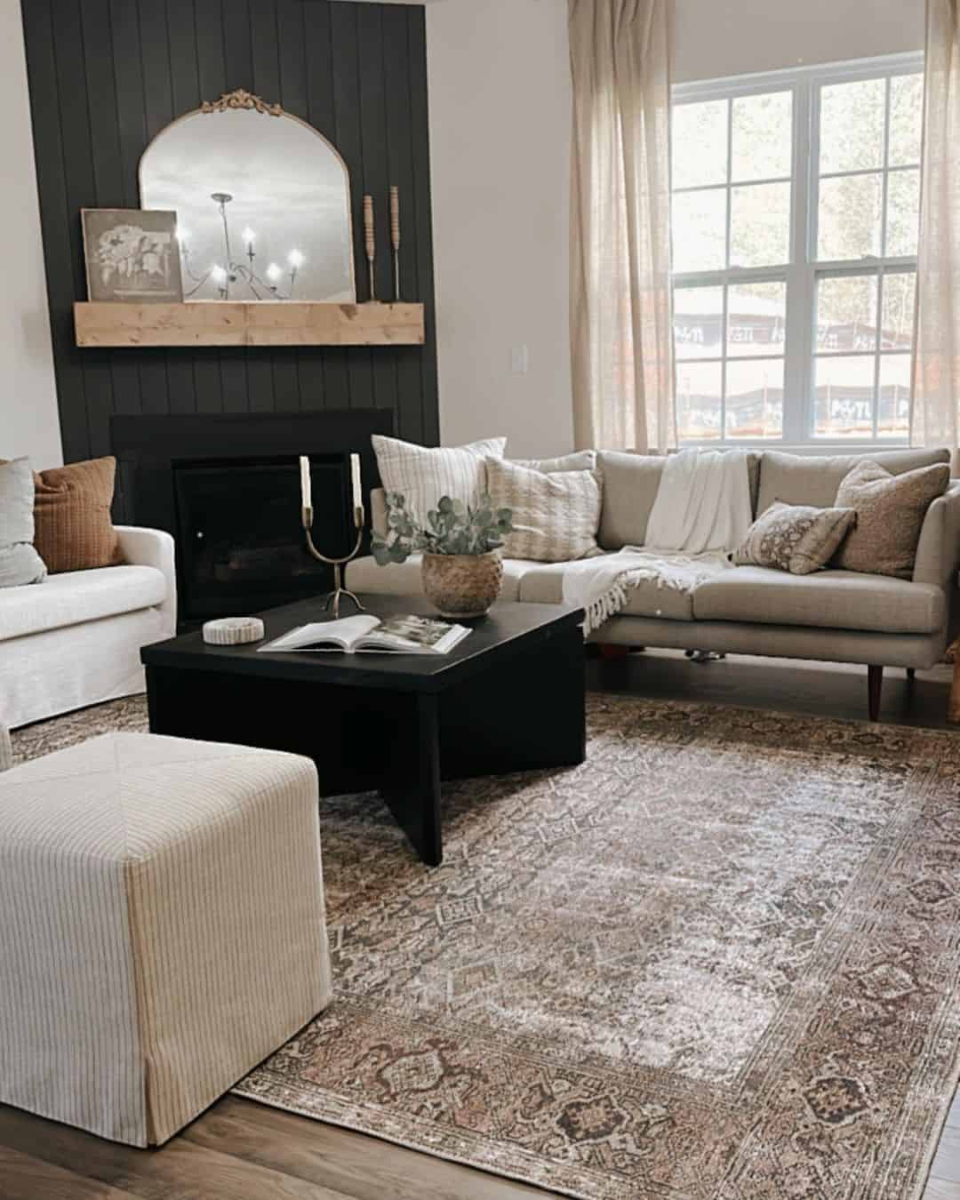 Embracing Neutrality in Your Living Room with a Black Fireplace