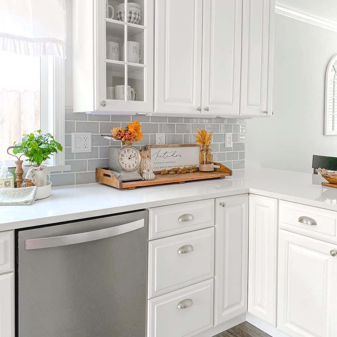 Enchanting Farmhouse Kitchen Featuring Light Gray Subway Tile