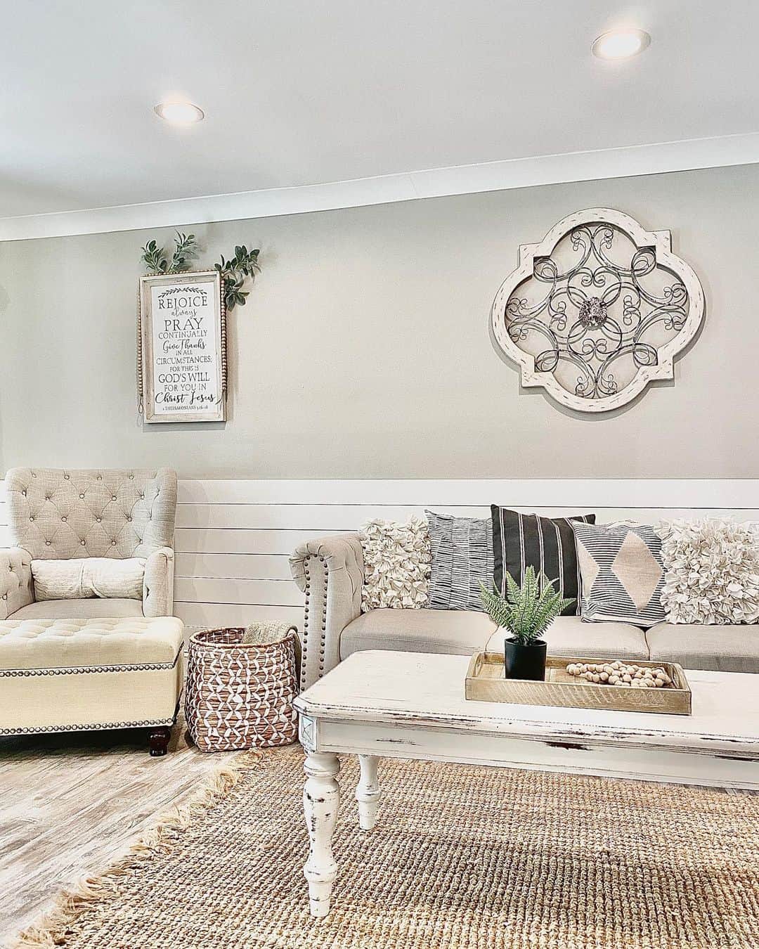 Farmhouse Living Room with White Shiplap Walls and Distressed Coffee Table