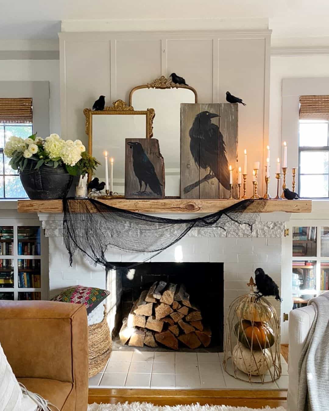 Halloween Raven Decorations Adorn a White Brick Fireplace