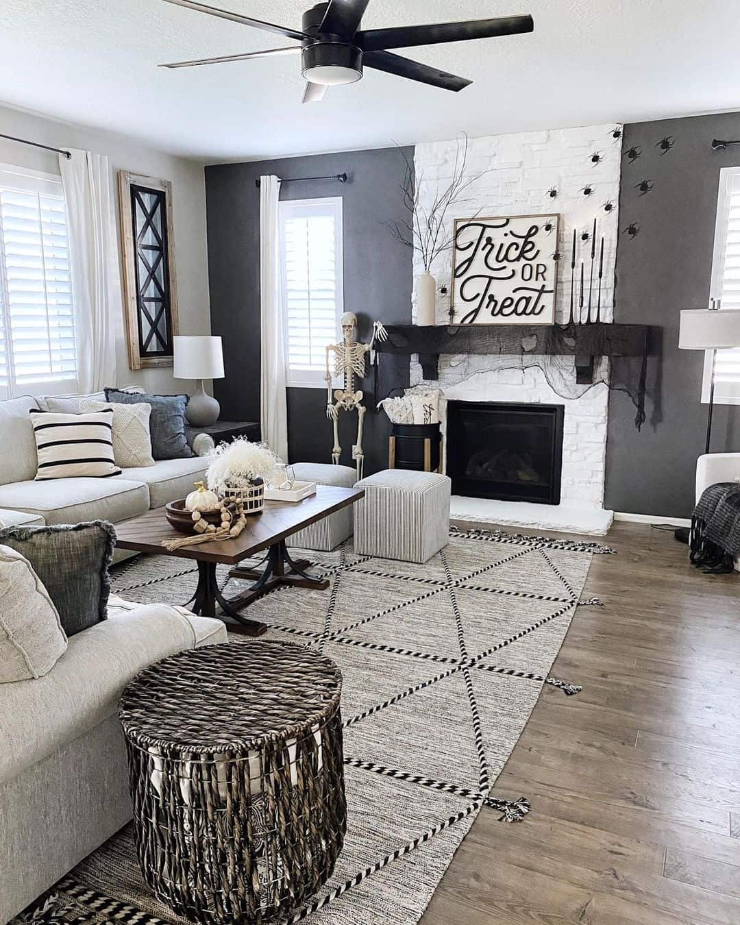 Hauntingly Beautiful White Stone Fireplace with Eerie Mantel Decor