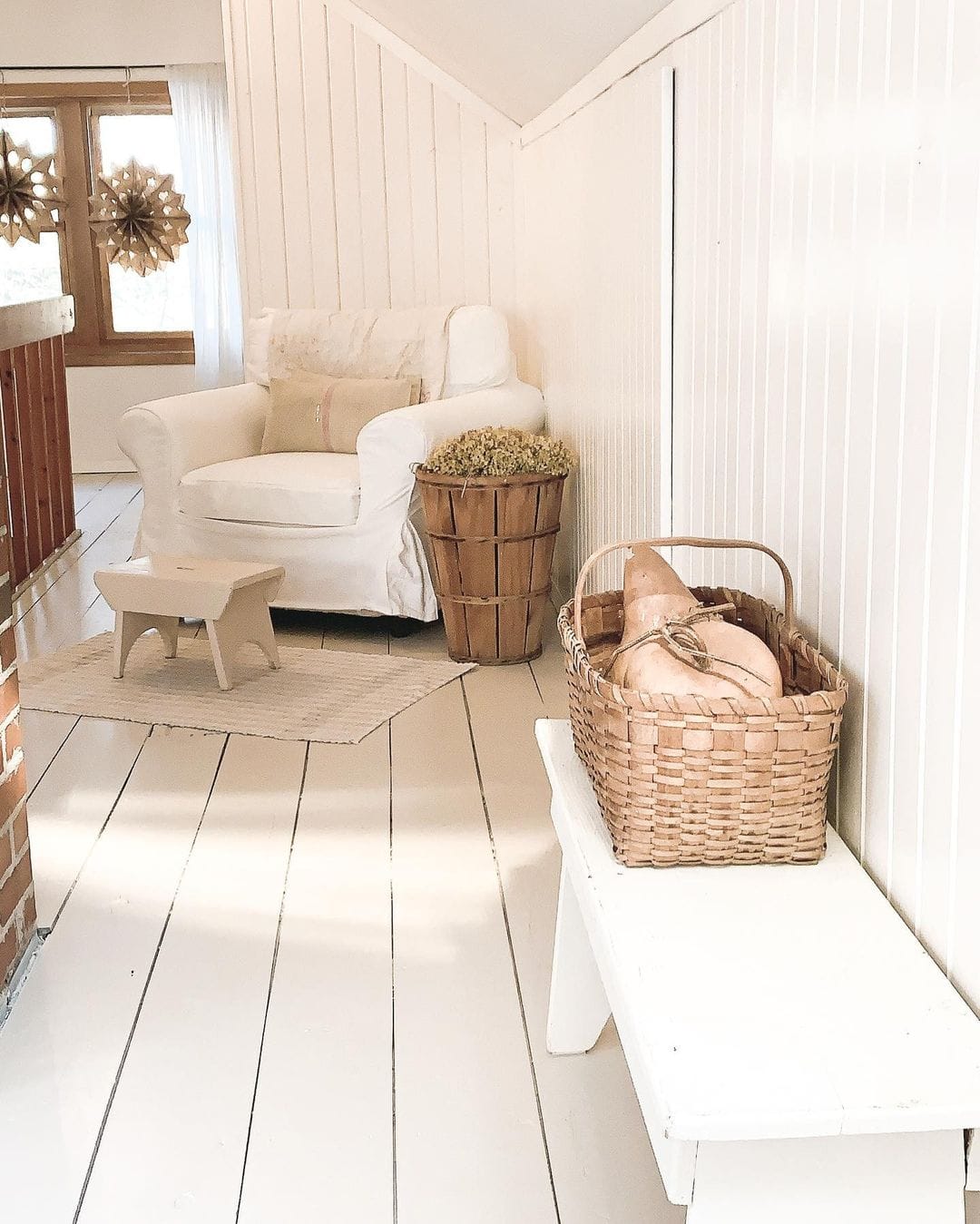 Matching Shiplap Walls and White-Painted Floors