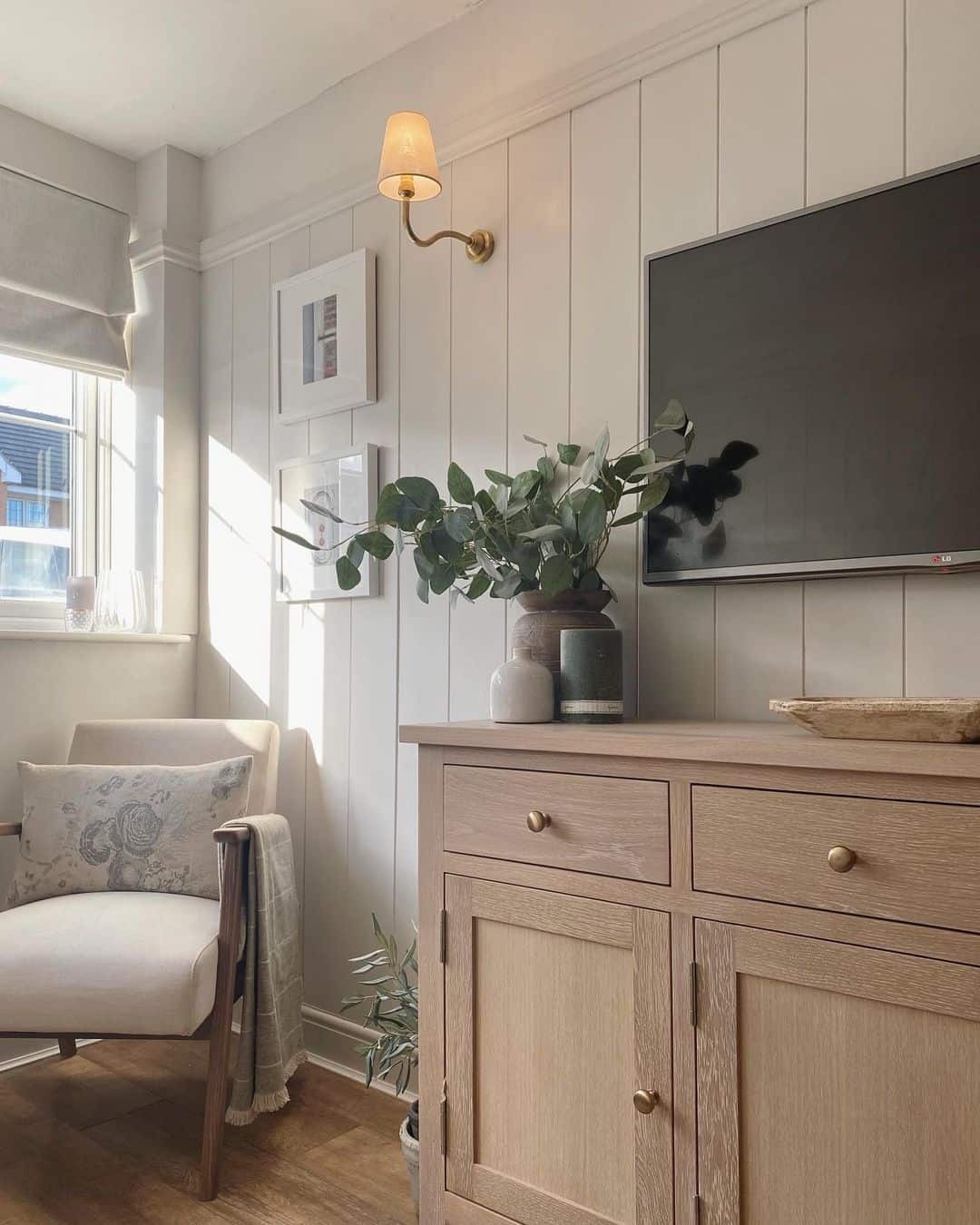 Paneling, Sconces, and Eucalyptus Accents