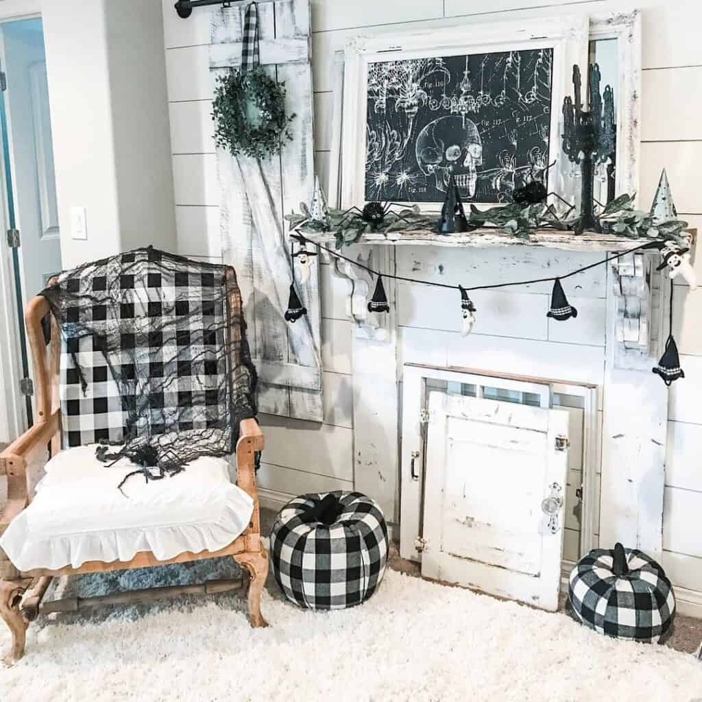 White Shiplap Fireplace Transformed by Black Halloween Accents