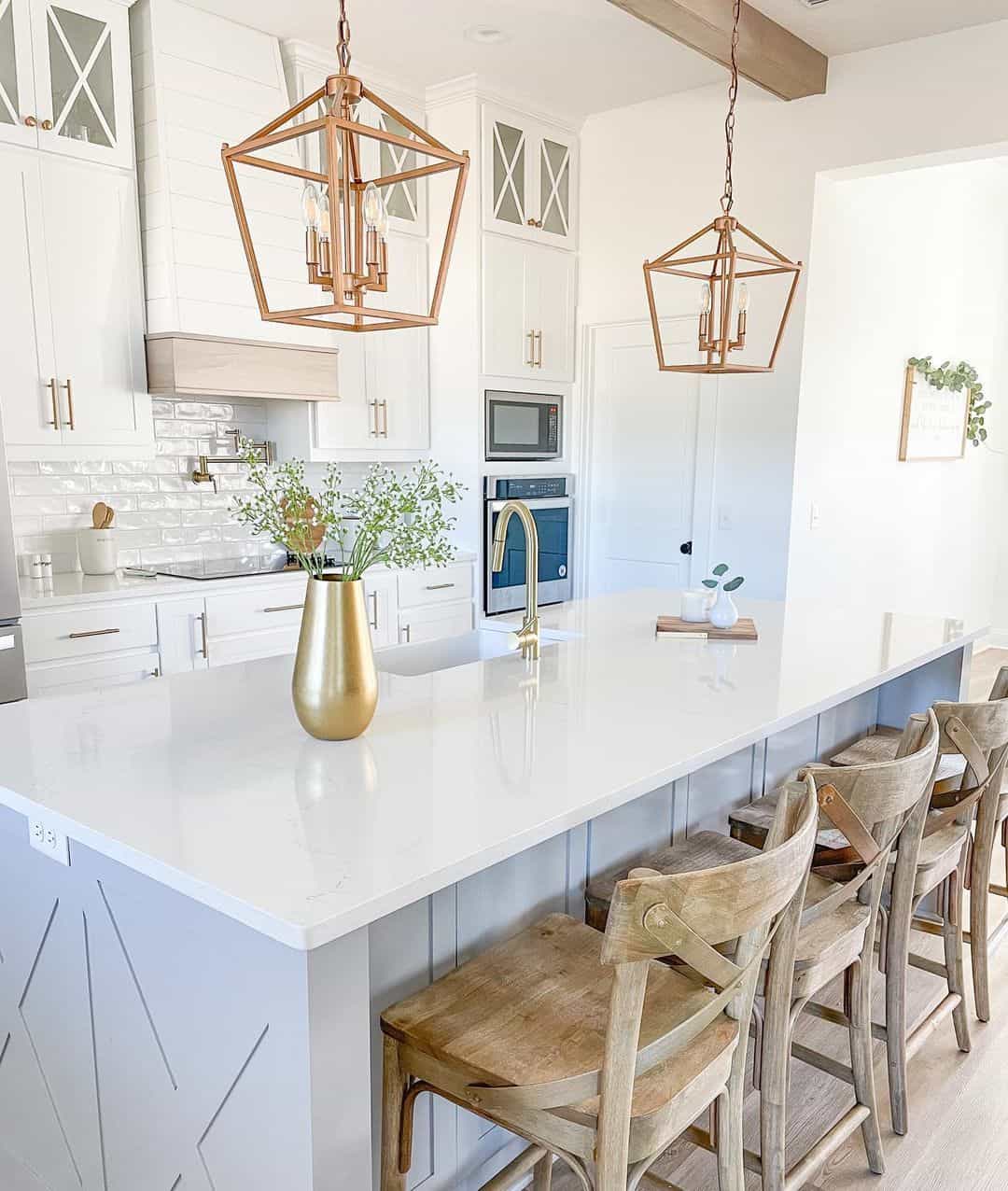 A Stylish Gray Kitchen Island Enhanced by Gold Vase Decor