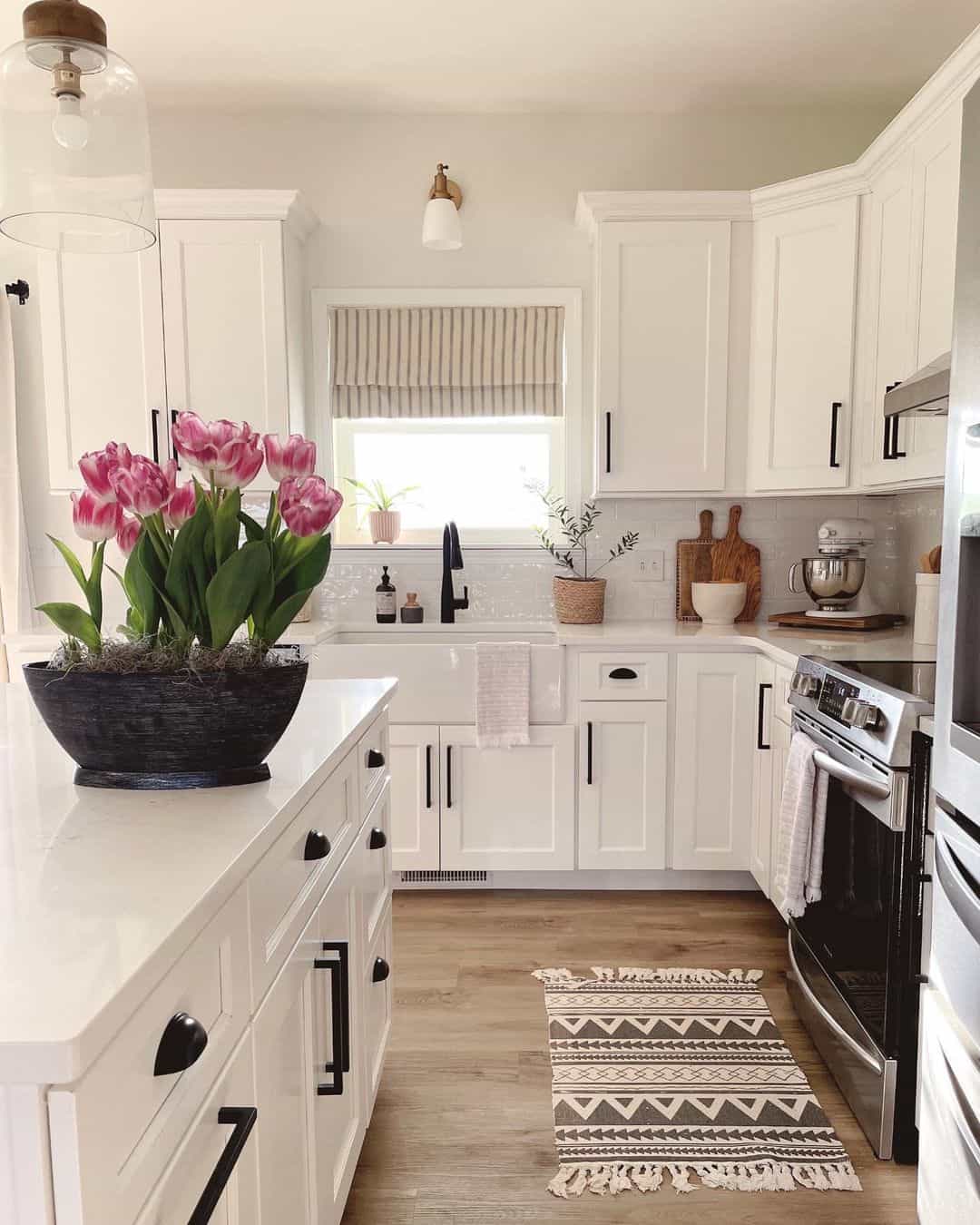 Black Accents Elevating Farmhouse White Kitchen Cabinets