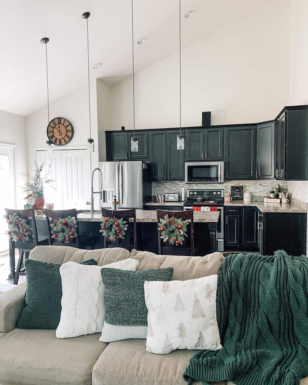 Black Cabinets and Green Wreaths for the Holidays