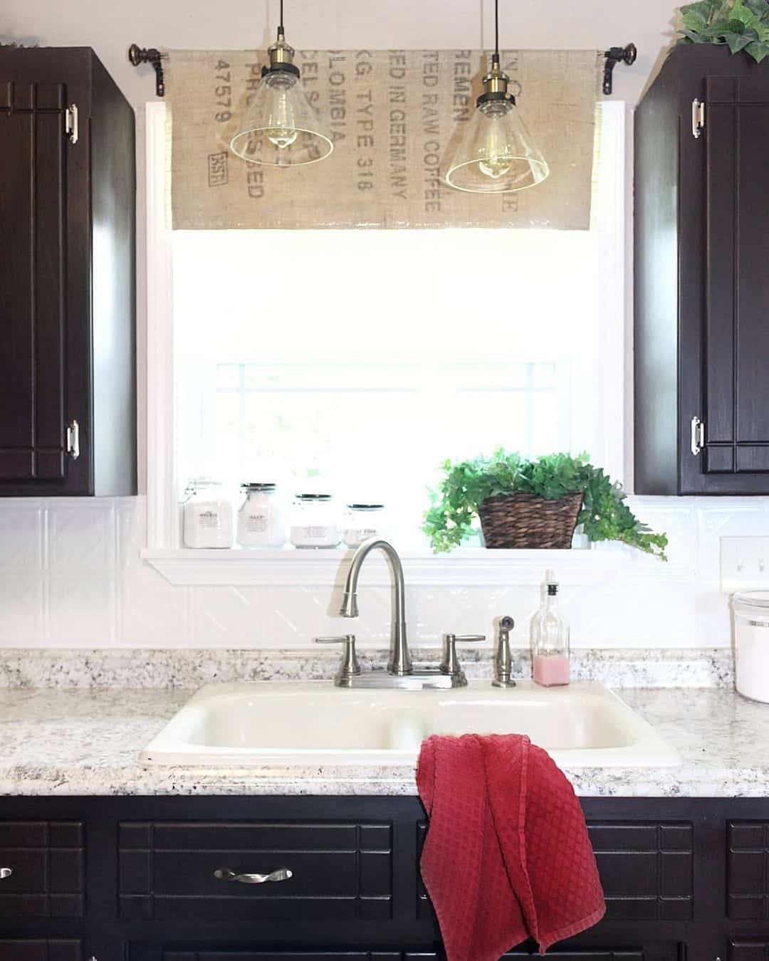 Black Cabinets and White Tiled Backsplash