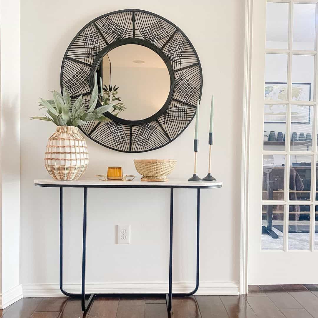Bold Statements with an Eye-catching Entryway Featuring a Black Woven Mirror