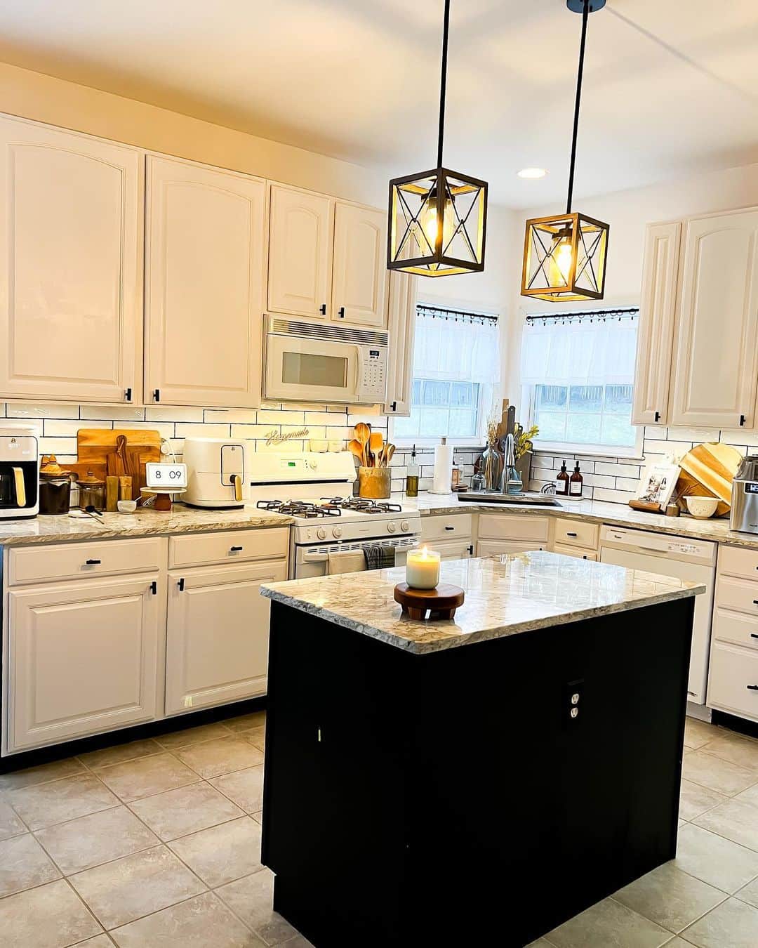 Contrasting Black Island in a White Kitchen