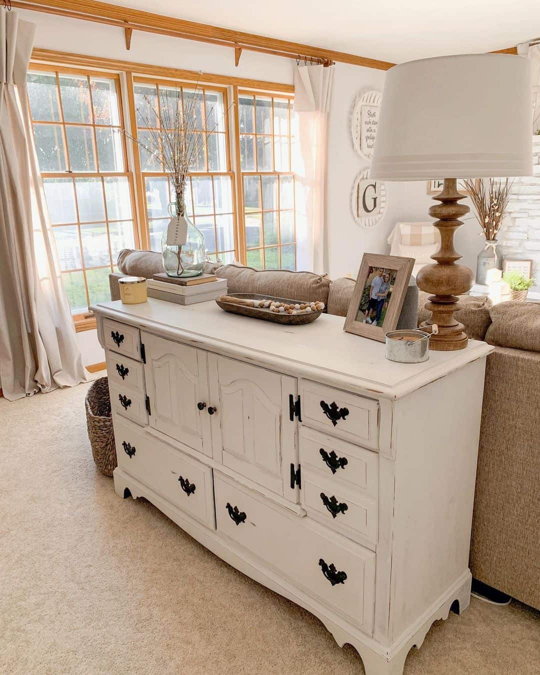 Farmhouse Living Room with Wooden Trim