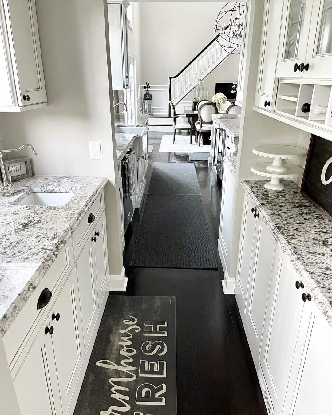 Kitchen Featuring Marble Countertop