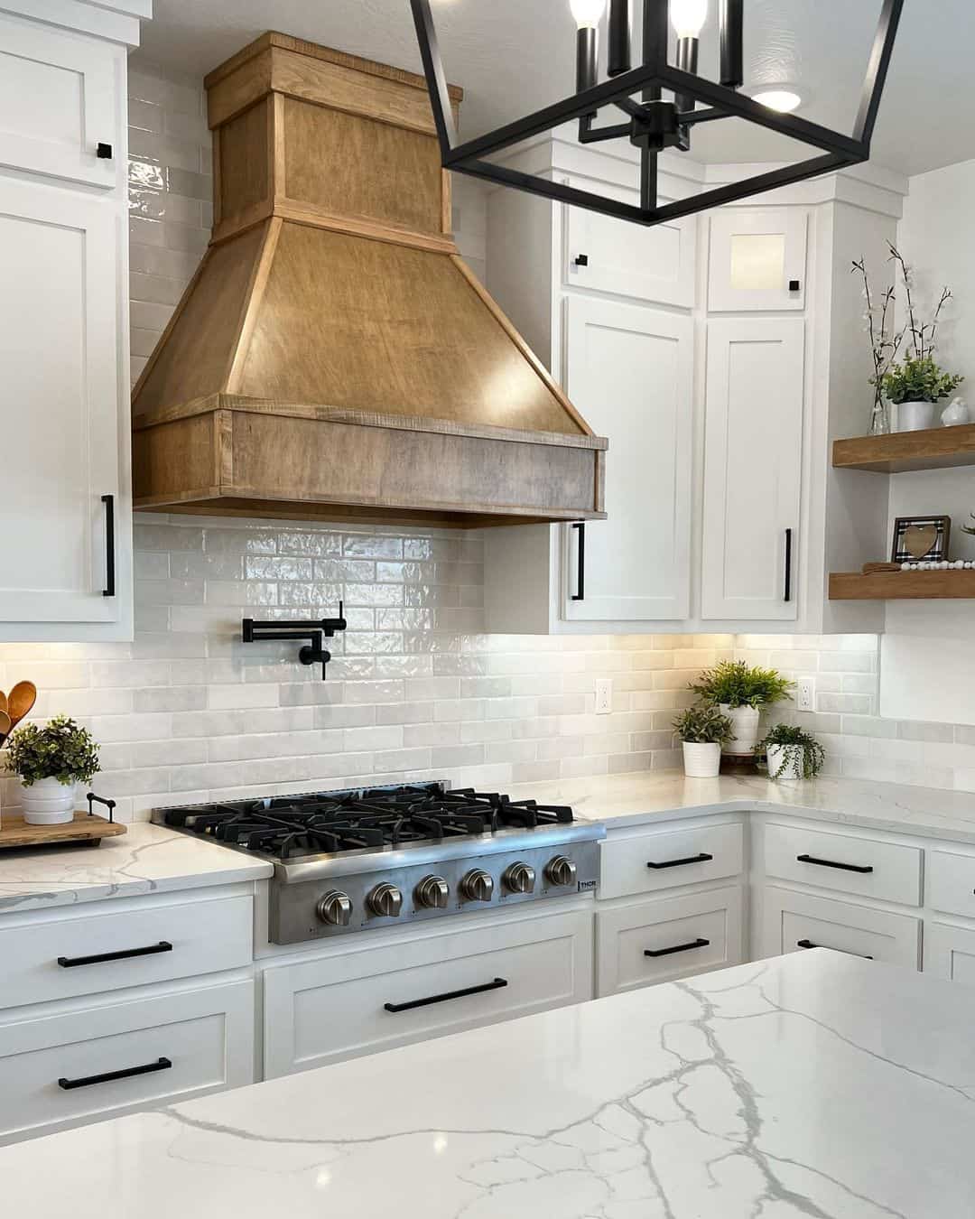 Quartz Countertop Illuminated by a Black Pendant Lamp