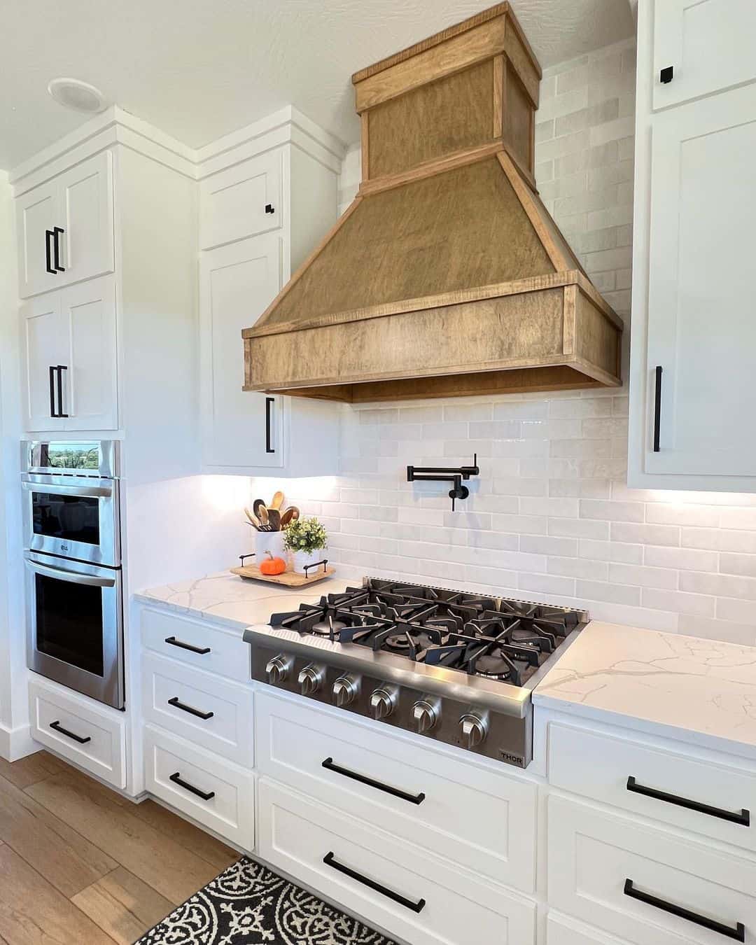 White Kitchen Backsplash Inspiration Featuring a Wood Range Hood
