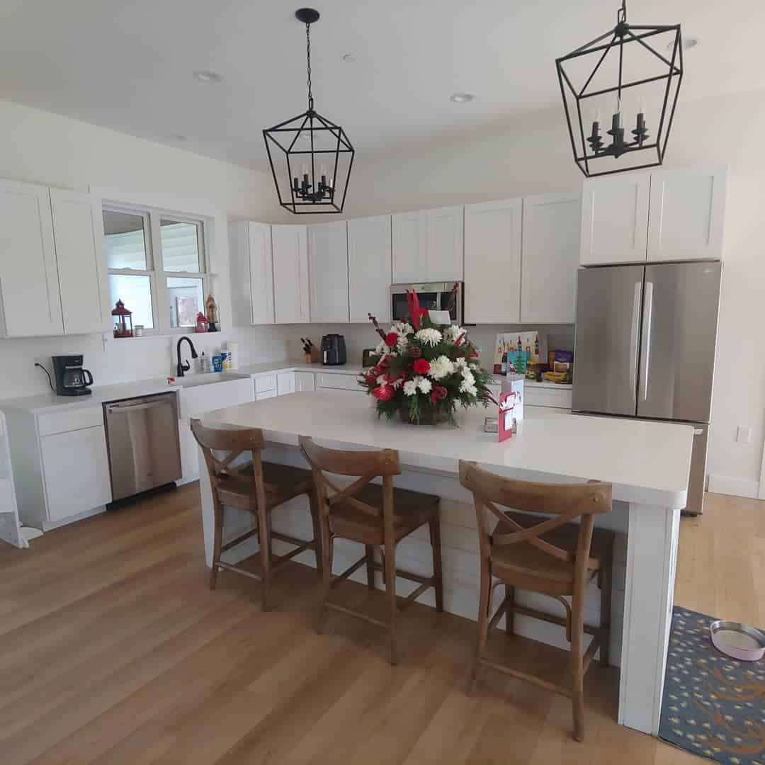 White Quartz Countertops in an Open Kitchen Space