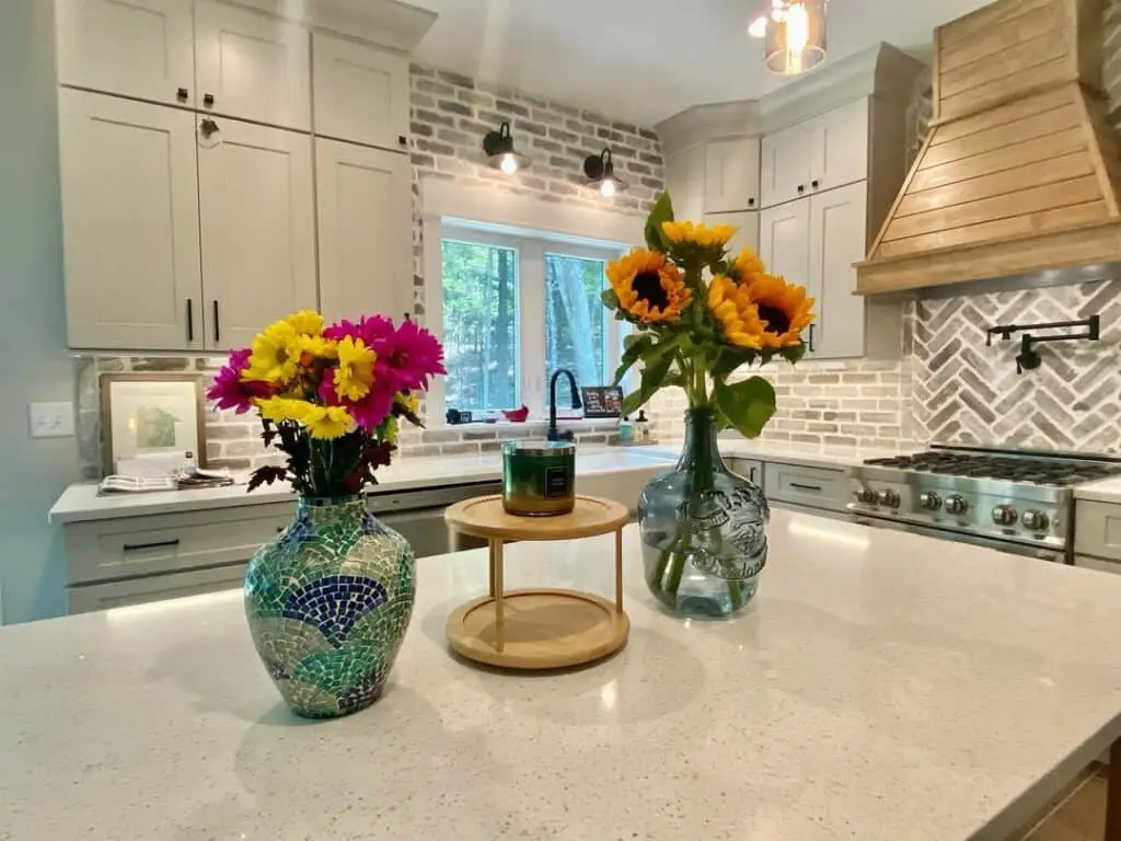 Flower Arrangements on the Kitchen Counter in Glass Vases