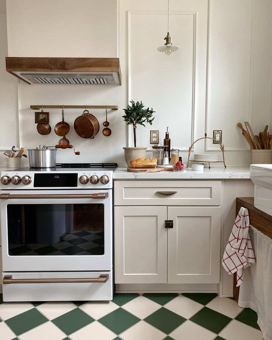 Gilded Nostalgia with a White and Gold Electric Range