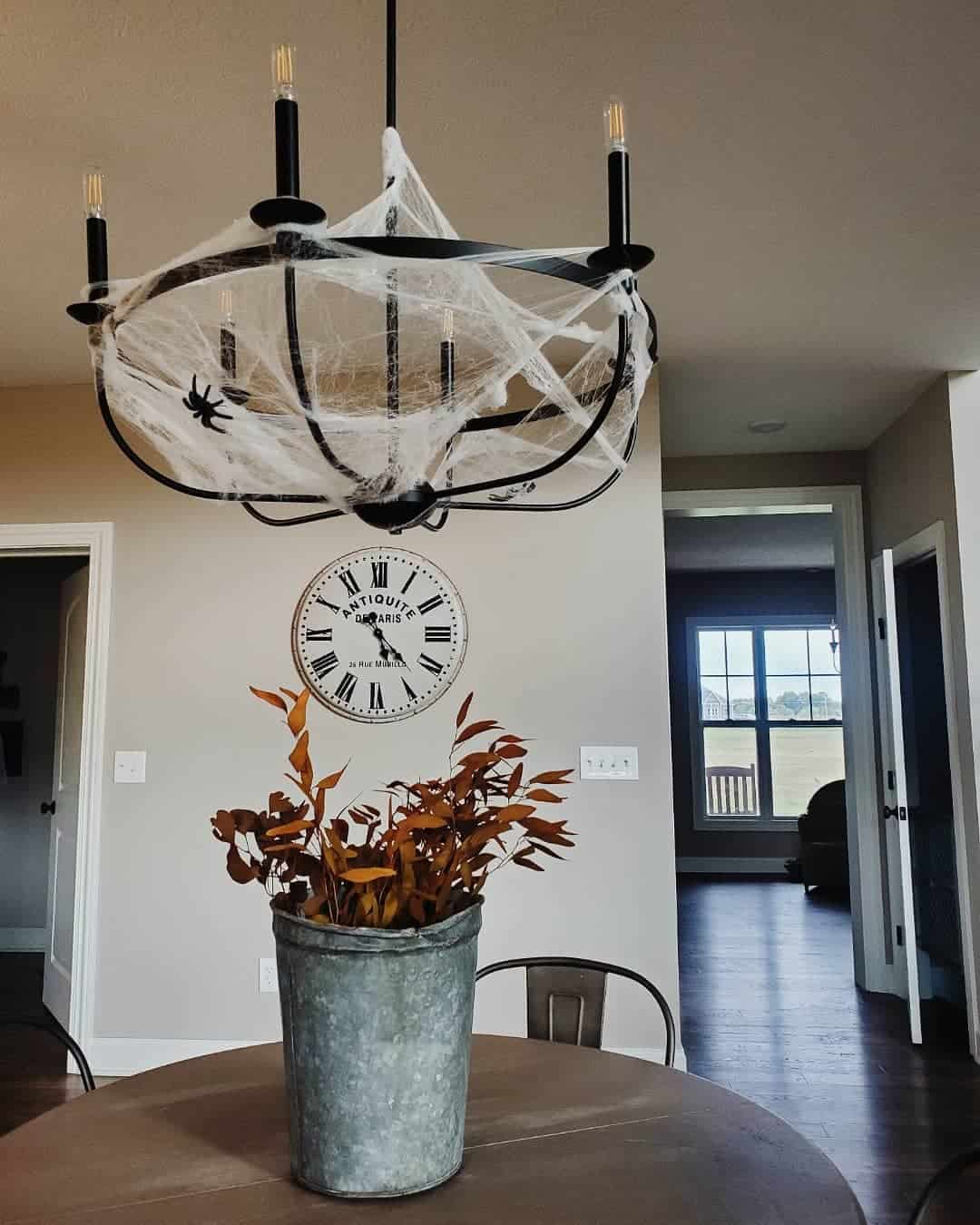 Haunting Chandelier with Spider Web Decor