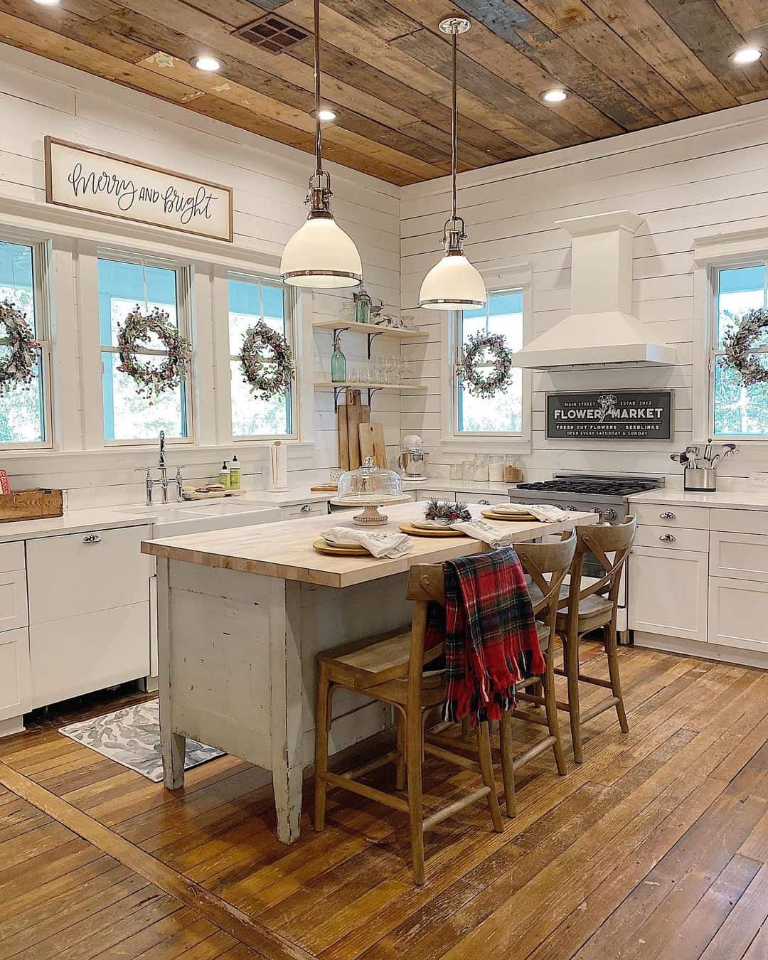 Reclaimed Wood Panel Adorning Farmhouse Kitchen Ceiling