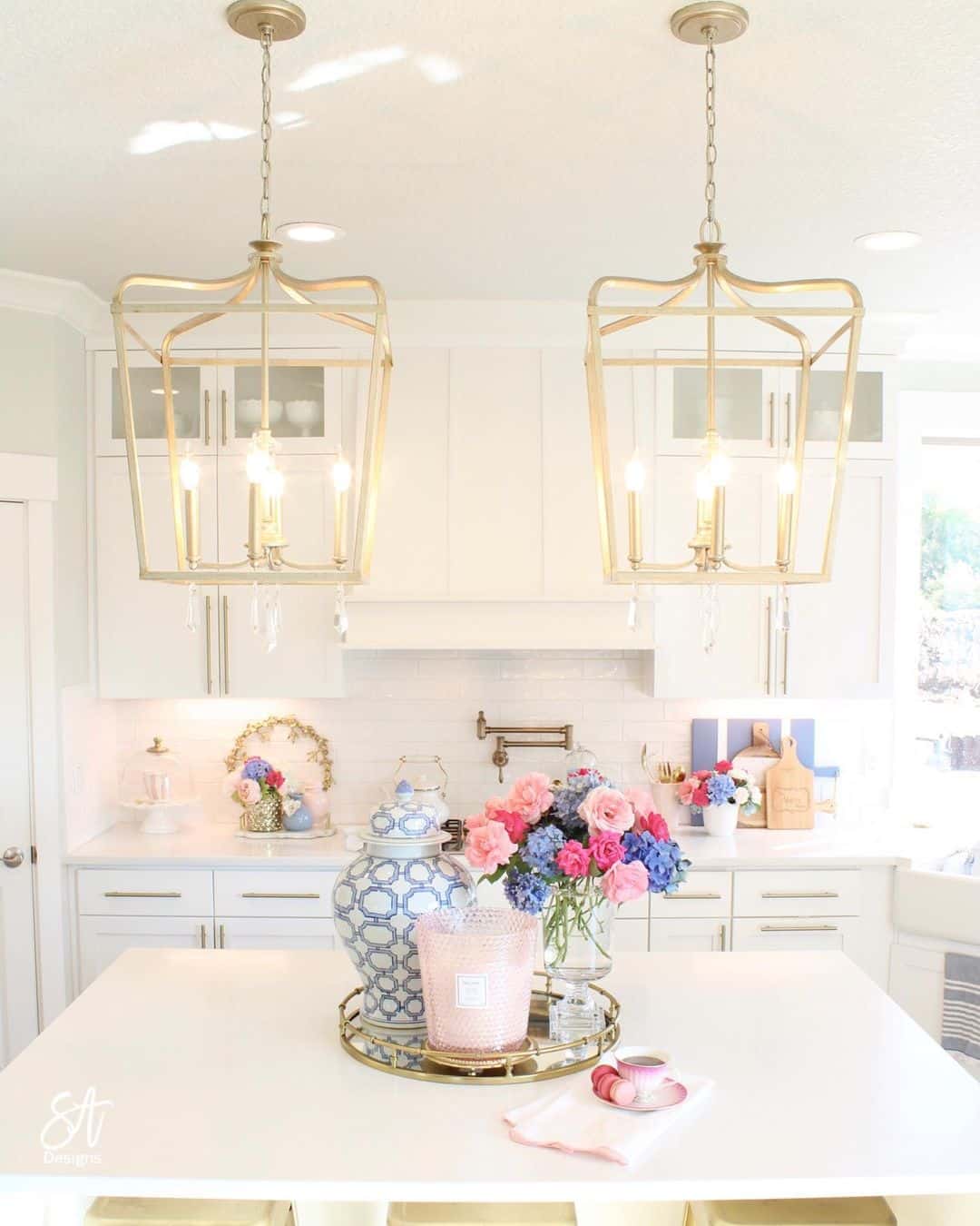 White Kitchen with Golden Lantern Lights