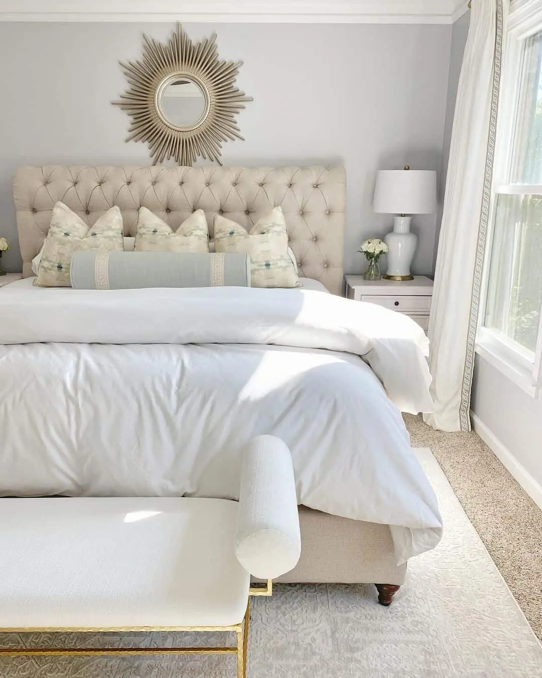 A Subtle Touch of Blue in a White Bedroom