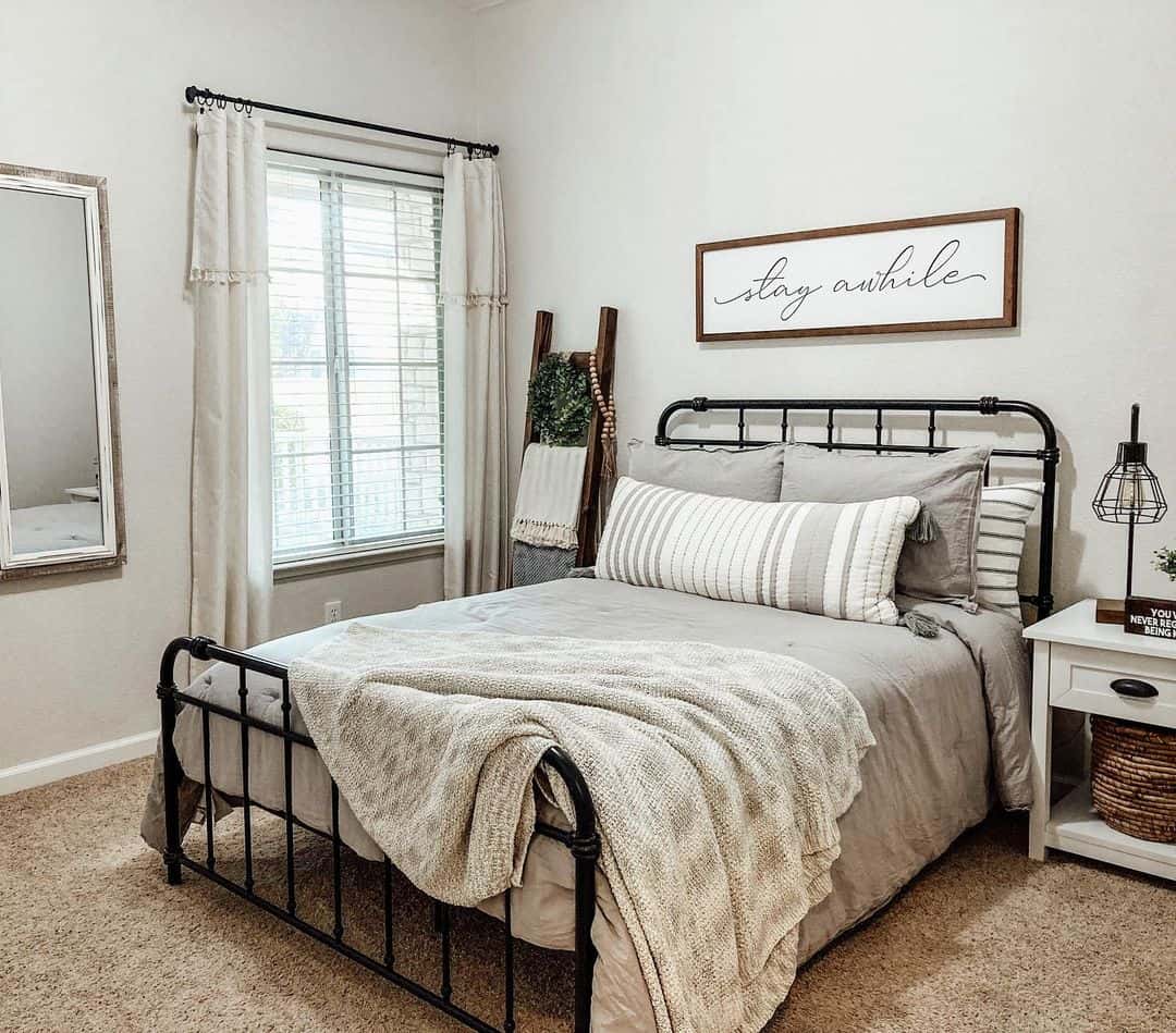 Elegant Guest Bed with Sleek Black Metal Spindle Frame