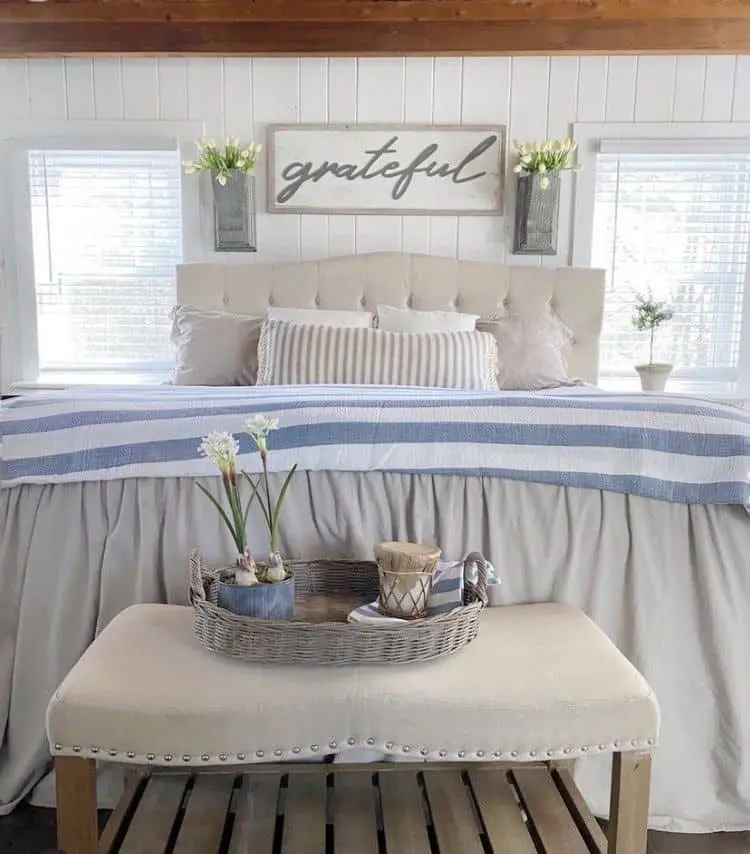 Timeless Bedroom Charm with a Blue and White Blanket