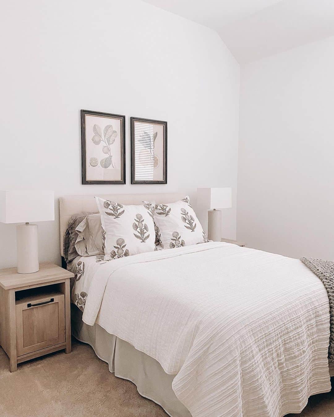 Tranquil Guest Bedroom with Elegant Gray Frame Artwork