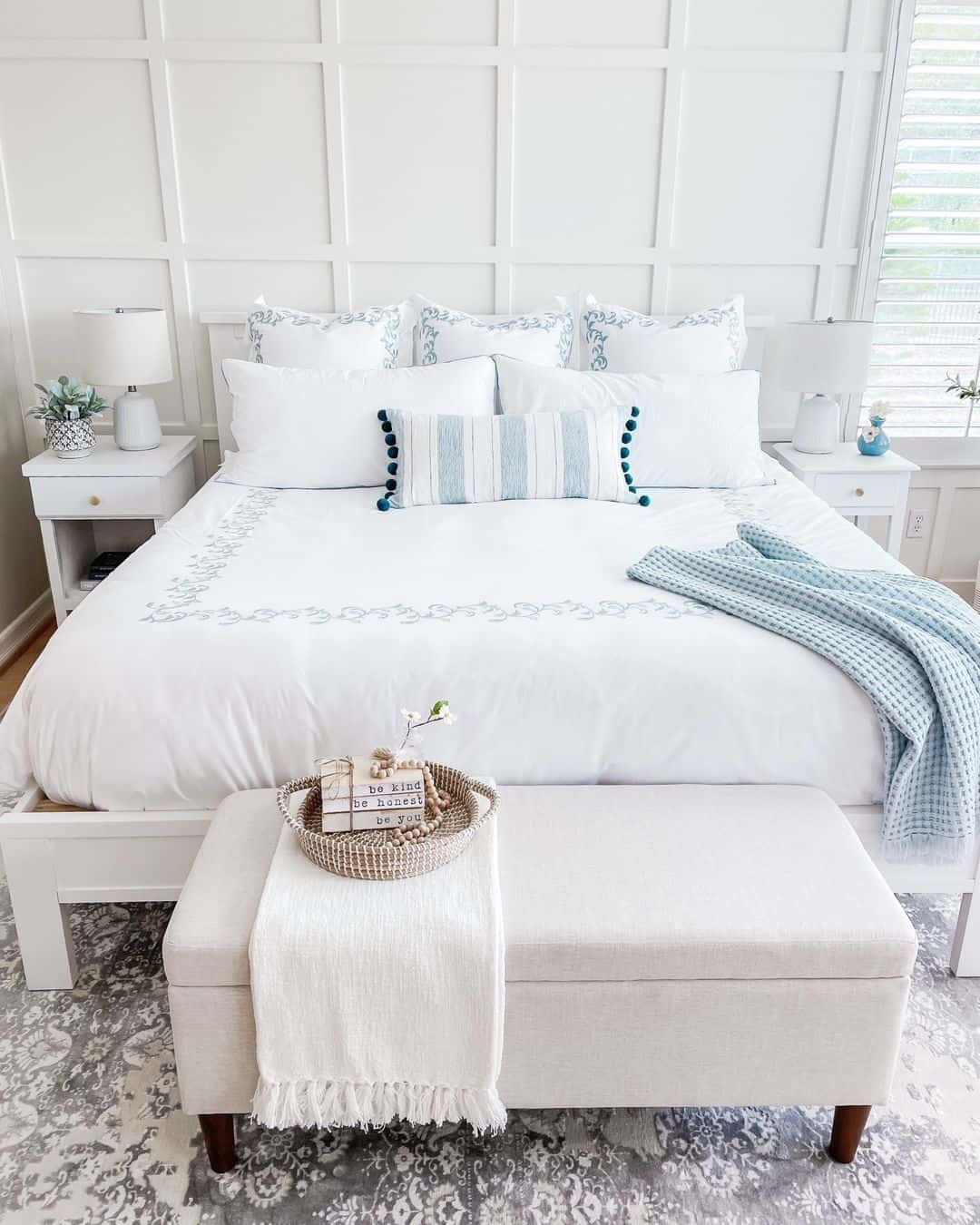 White Bedroom Oasis with Ottoman