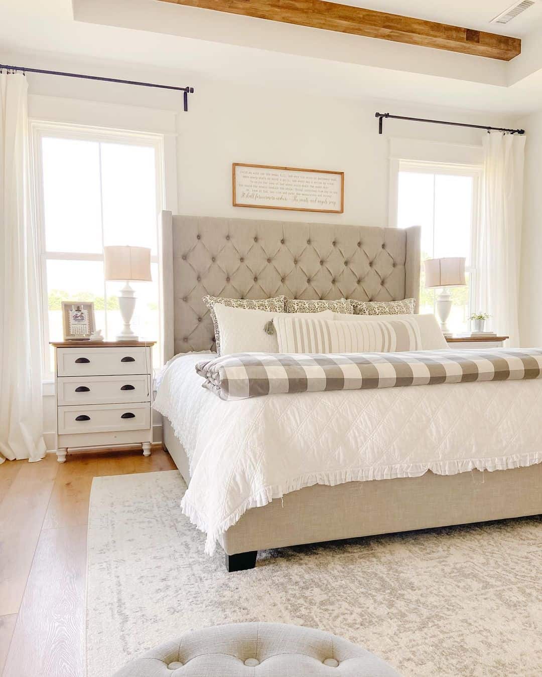 White Farmhouse Bedroom Enhanced by Greige Tufted Bed