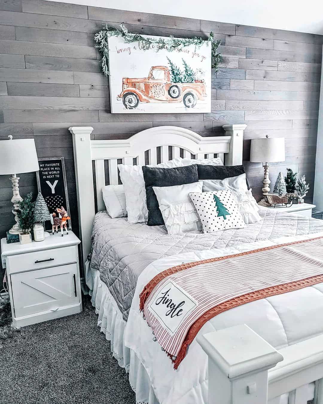 Holiday Farmhouse Bedroom Accentuated by a Gray Wood Feature Wall