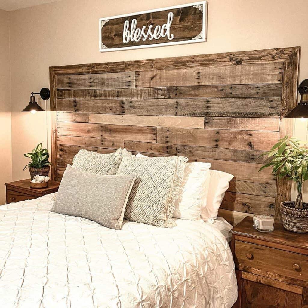 Natural Wood Headboard Enhanced by Sconces