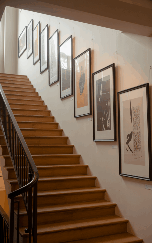 Add oversized artwork along the ascent.