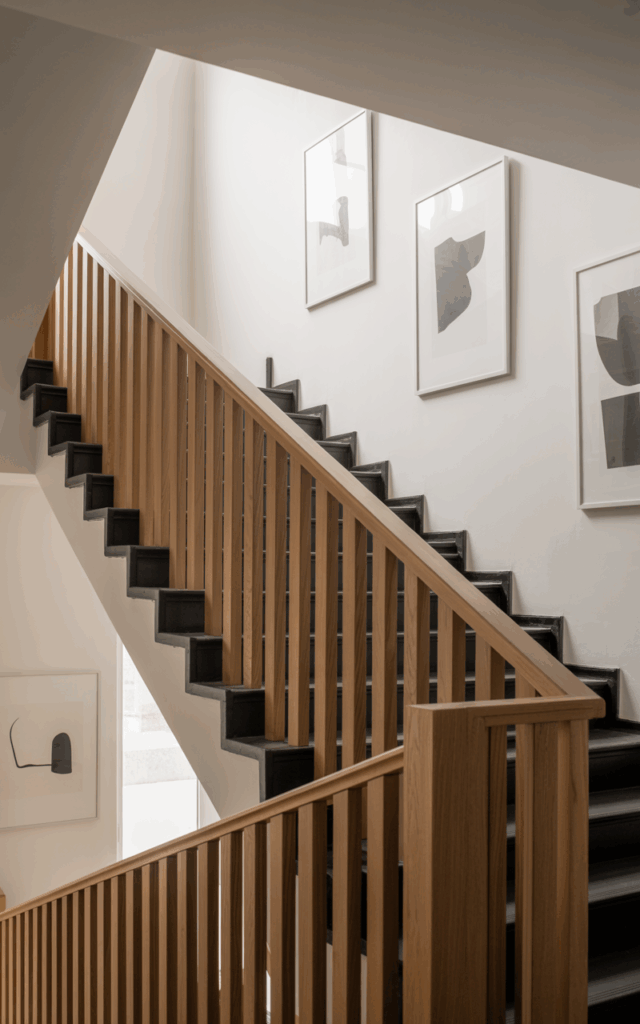 Contrast light oak railings against dark stair treads