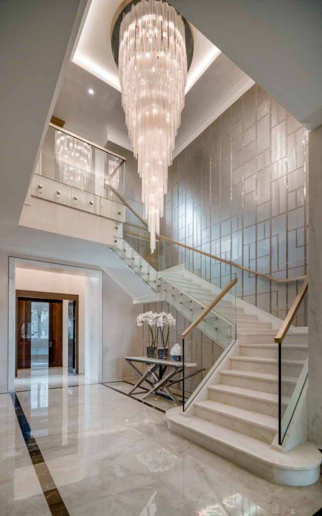 Create drama with a double-height chandelier