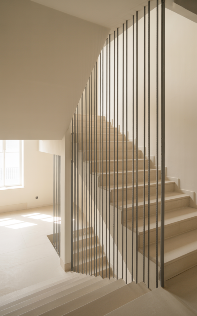 Install black balusters against white walls
