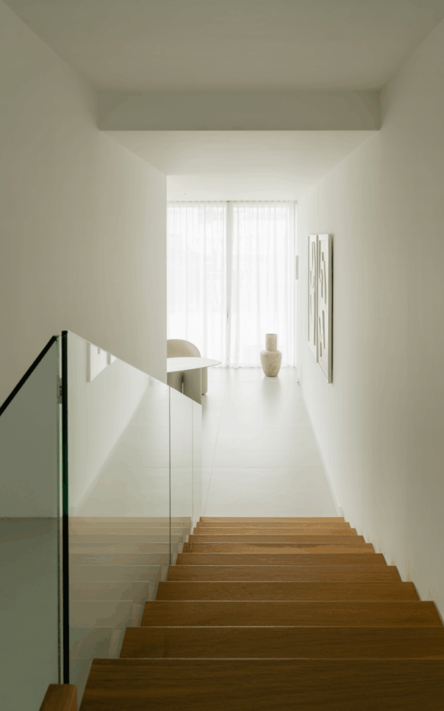 Keep the railing ultra-minimal and frameless