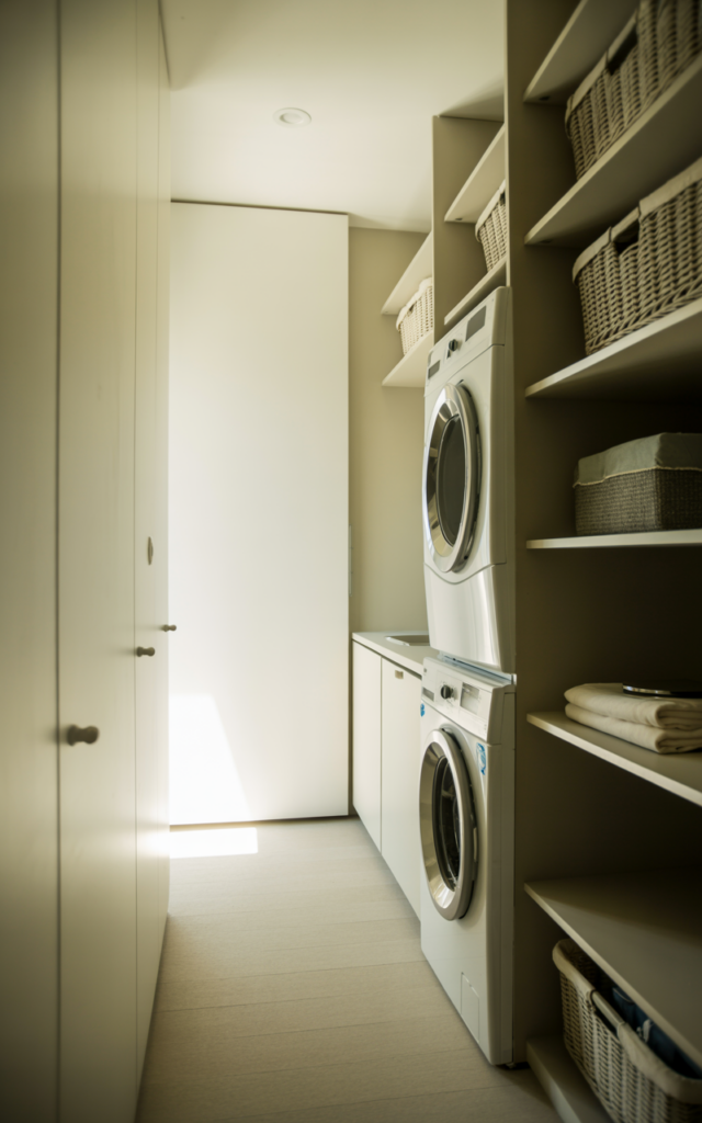 Stack the washer and dryer to free up floor space