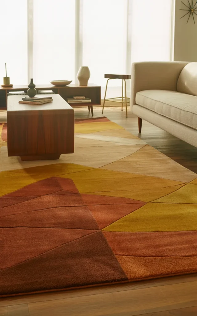Layer in a geometric area rug for subtle drama