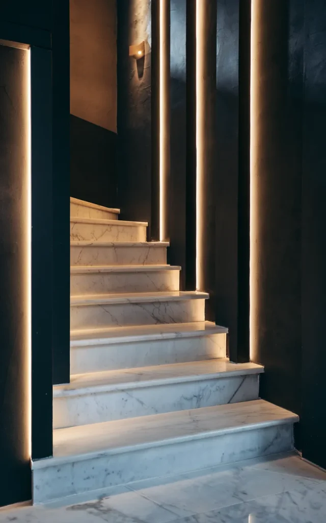 Contrast Marble Steps with Dark Walls