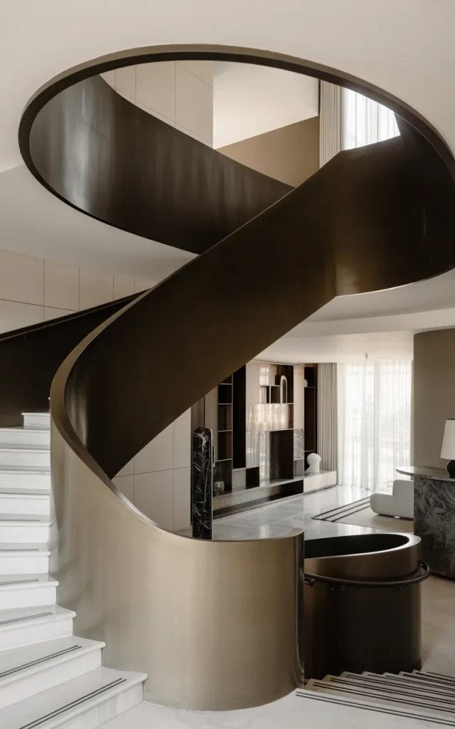 Create a sculptural curved metal railing