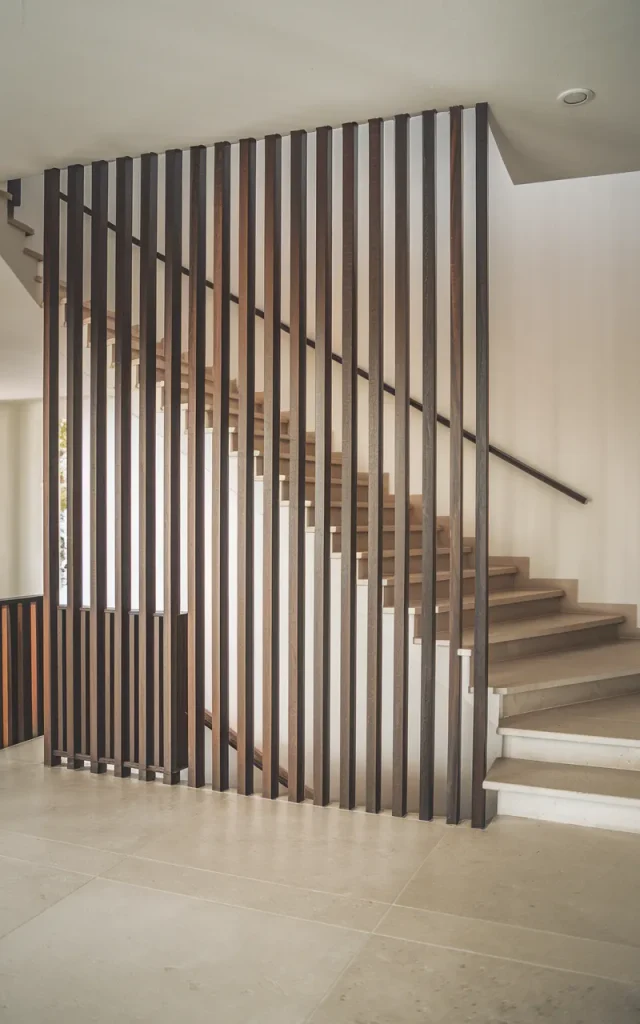 Create drama with vertical slat railings