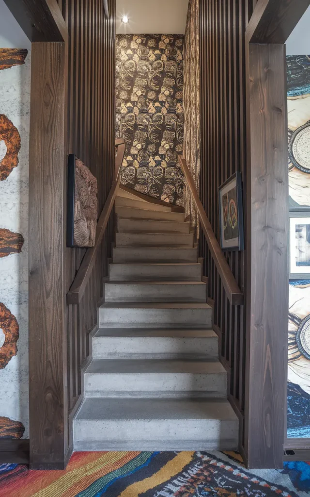 Frame the staircase with a statement wall