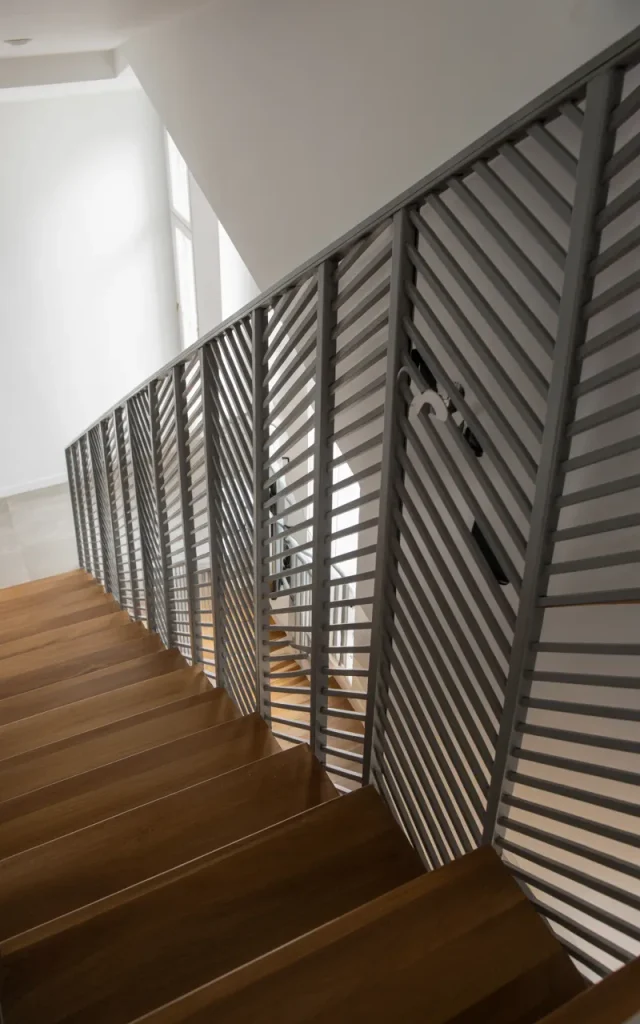 Frame your staircase with geometric steel railings