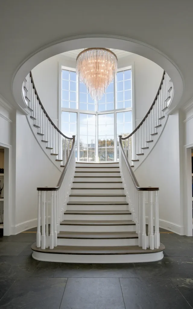 Highlight the Staircase with Statement Lighting Above