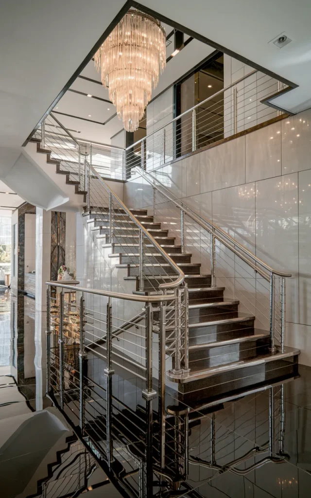 Install high-gloss tiles for a glamorous statement staircase