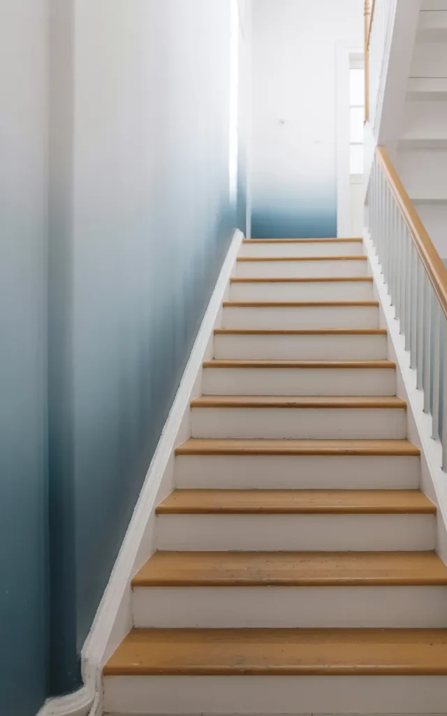 Paint a soft ombré gradient along the staircase wall