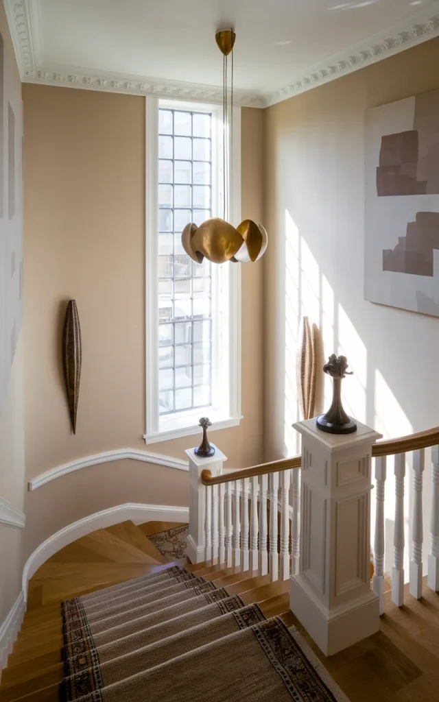 Place a sculptural pendant light above the landing